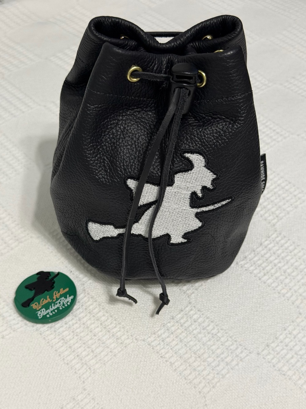 Black Leather Drawstring Bucket Bag with White Witch Patch